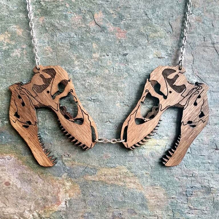 chimeric-garnish-t-rex-dinosaur-skull-necklace-engraved-in-mahogany